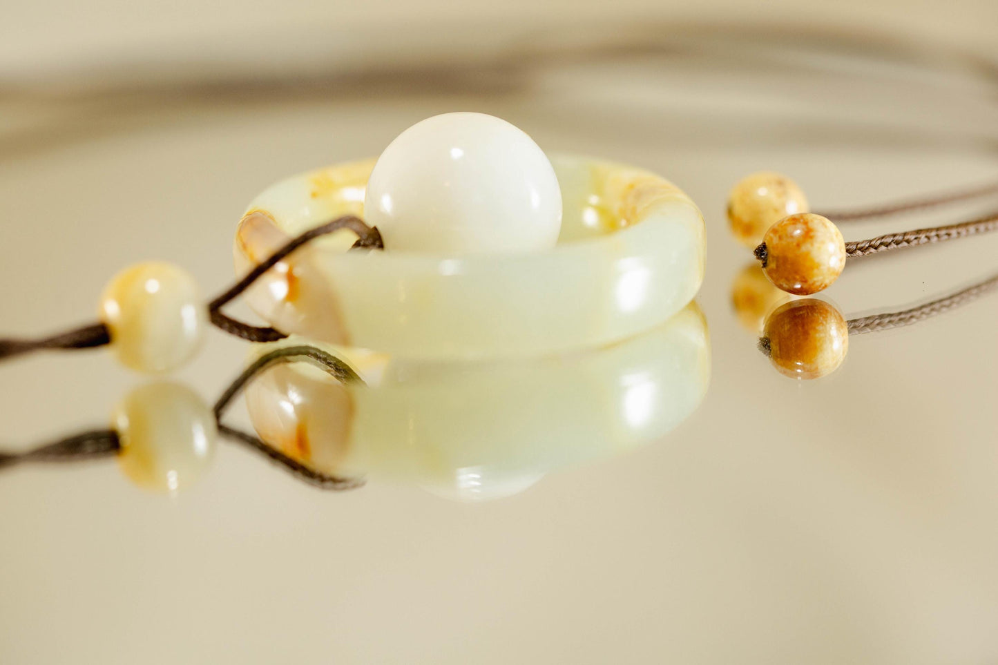 White and Yellow Jade Ring and Sphere Pendant Handcarved from Siberian Jade on Paracord with Four Siberian Accent Beads