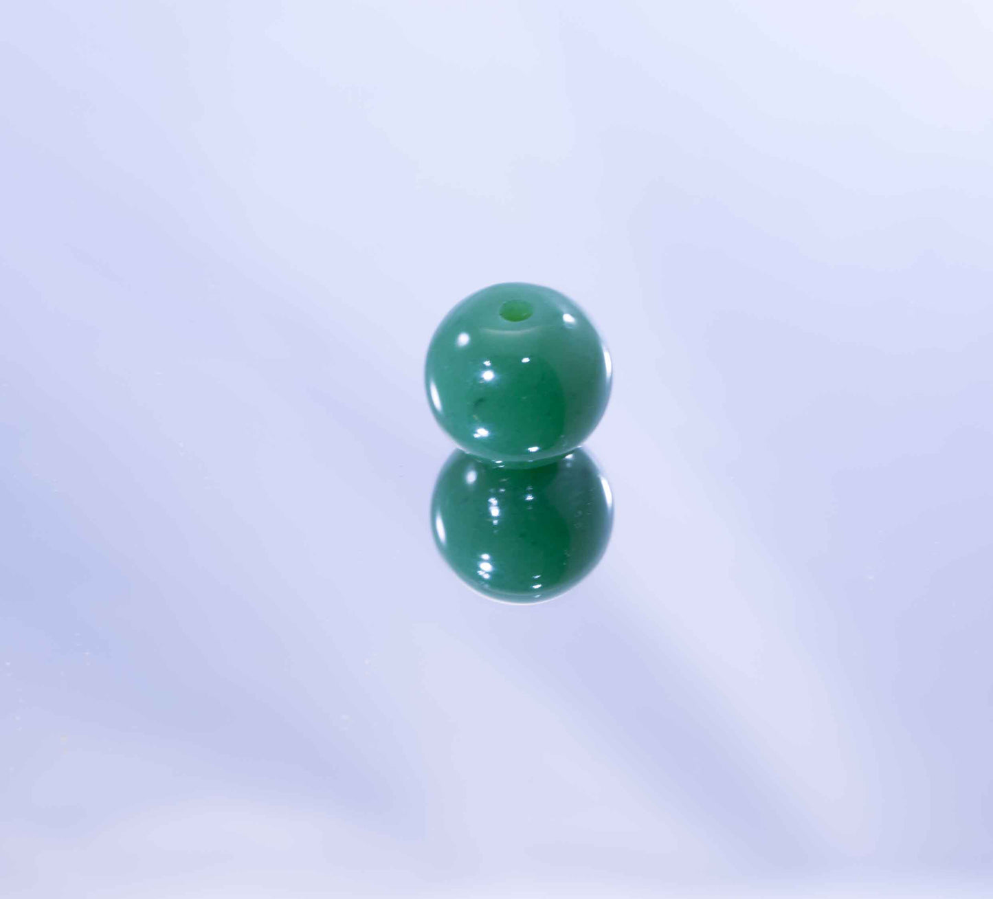 Collector-Grade Apple Green Wyoming Jade Sphere