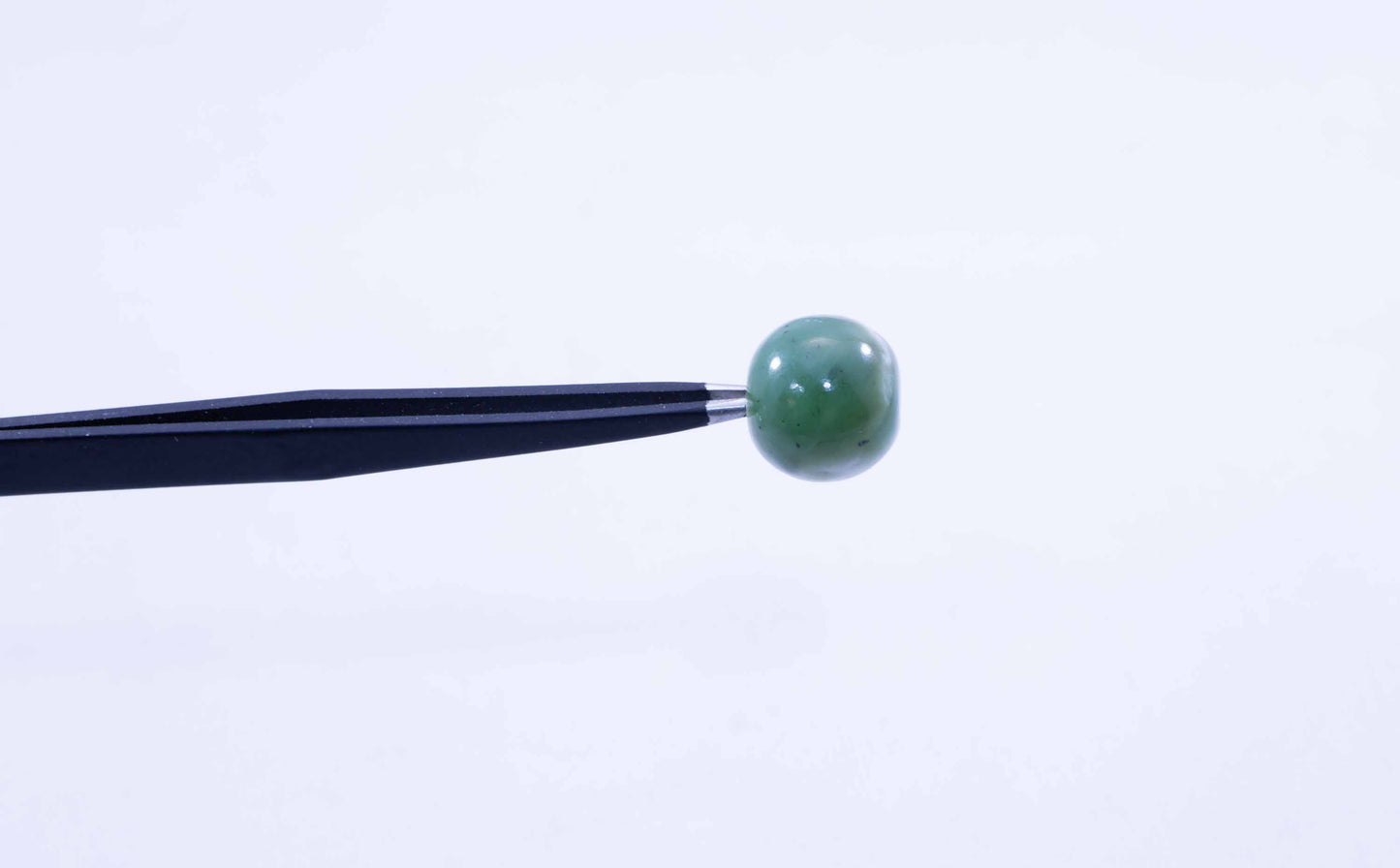 Collector-Grade Apple Green Wyoming Jade Sphere