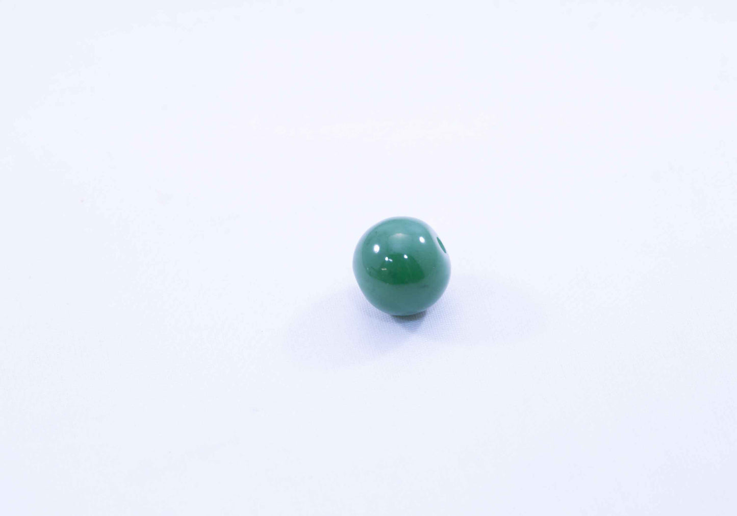 Collector-Grade Apple Green Wyoming Jade Sphere