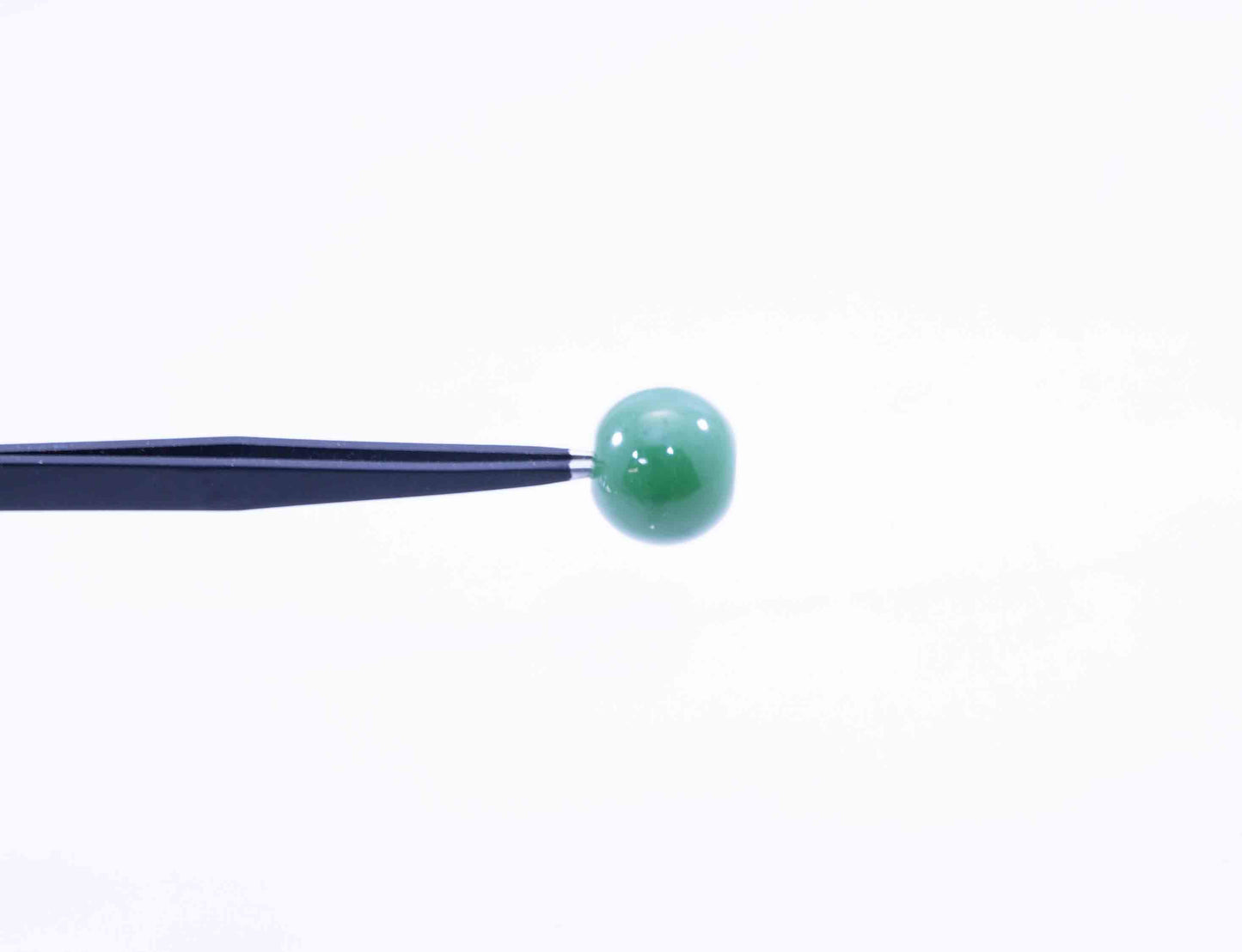 Collector-Grade Apple Green Wyoming Jade Sphere