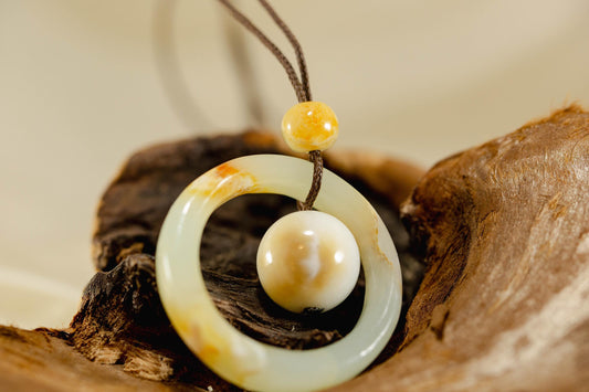 White and Yellow Jade Ring and Sphere Pendant Handcarved from Siberian Jade on Paracord with Four Siberian Accent Beads