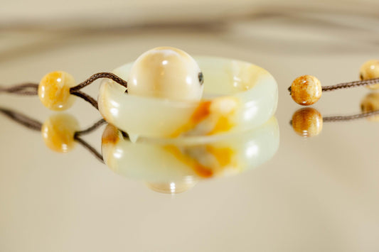 White and Yellow Jade Ring and Sphere Pendant Handcarved from Siberian Jade on Paracord with Four Siberian Accent Beads